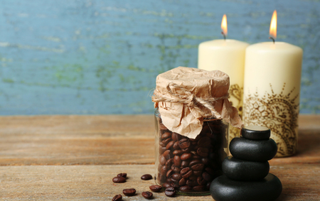 Beautiful spa composition with decorative Indian candles, on wooden tableの写真素材