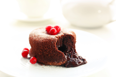 Hot chocolate pudding with fondant centre on plate, close-upの写真素材