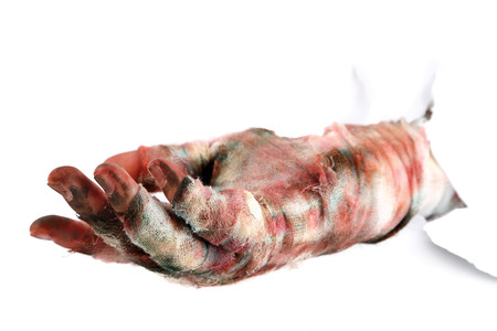 Hand of mummy isolated on whiteの写真素材