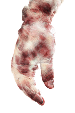 Hand of mummy isolated on whiteの写真素材