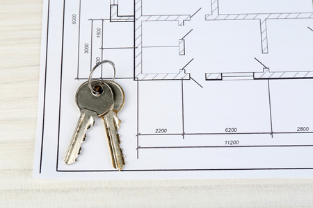 Key on house plan close-upの写真素材