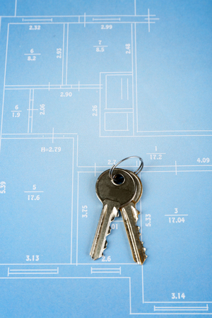 Key on house plan close-upの写真素材