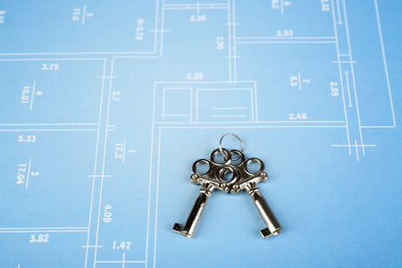 Key on house plan close-upの写真素材