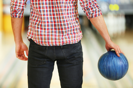 Male with bowling ball in clubの写真素材