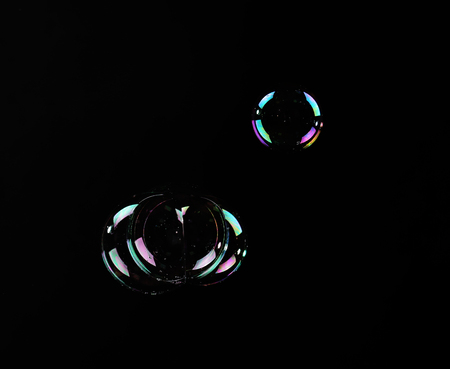 Soap bubbles, on black backgroundの写真素材