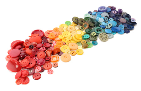 Colorful sewing buttons isolated on white