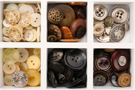 Various of sewing buttons in box, macro view
