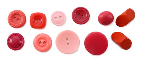 Colorful sewing buttons isolated on white