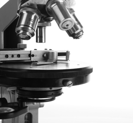 Microscope close-up, isolated on whiteの写真素材