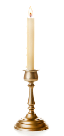 Retro candlestick with candle, isolated on whiteの写真素材