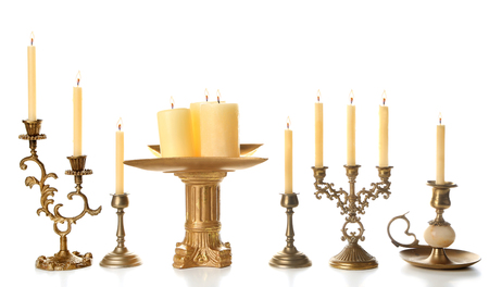 Retro candlesticks with candles, isolated on whiteの写真素材