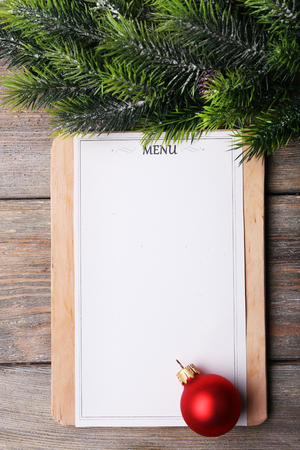 Menu board with Christmas decoration on wooden planks backgroundの写真素材