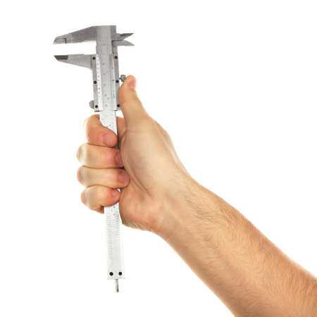 Adjustable wrench in male hand isolated on whiteの写真素材