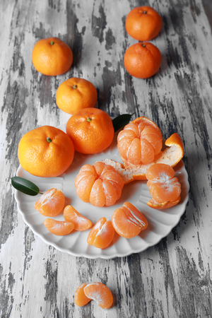 Tangerines on wooden tableの写真素材
