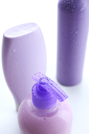 Cosmetic bottles isolated on whiteの写真素材