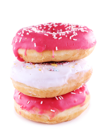 Delicious donuts with icing isolated on whiteの写真素材