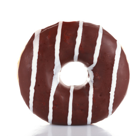 Delicious donut with icing isolated on whiteの写真素材
