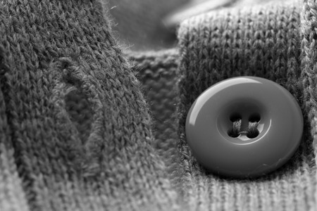 Button on clothes close up
