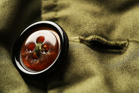 Button on clothes close up