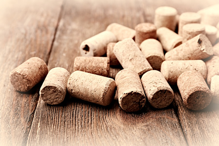 Wine corks on wooden background