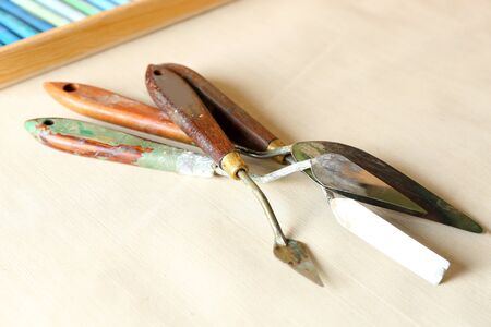 Palette knife on fabric backgroundの写真素材