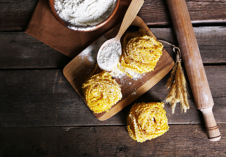 Still life of preparing pasta on rustic wooden backgroundの写真素材