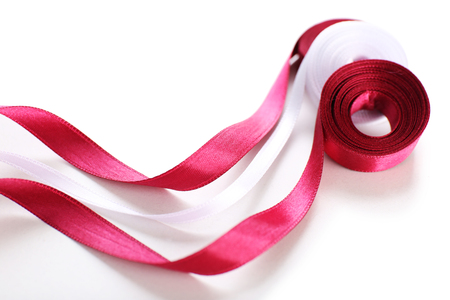 Colorful vinous and white ribbons isolated on whiteの写真素材