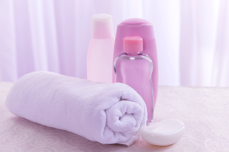 Baby accessories for bathing on table on light backgroundの写真素材