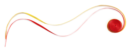 Colorful red and yellow ribbons isolated on whiteの写真素材