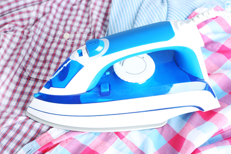 Iron on clothes close-upの写真素材