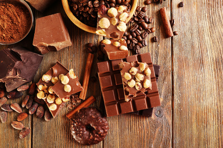 Still life with set of chocolate on wooden table, top viewの写真素材