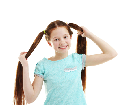 Beautiful little girl, isolated on whiteの写真素材