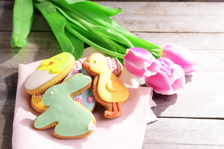 Delicious Easter cookies on table close-up