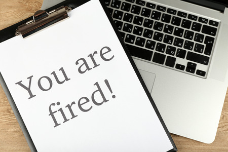 Message You're Fired on laptop keyboard, closeupの写真素材