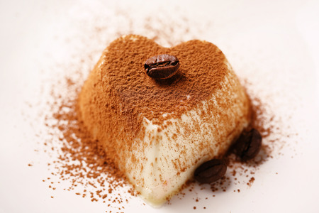 Tasty panna cotta dessert on plate, close up の写真素材