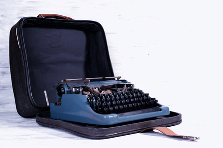 Retro typewriter on wooden backgroundの写真素材