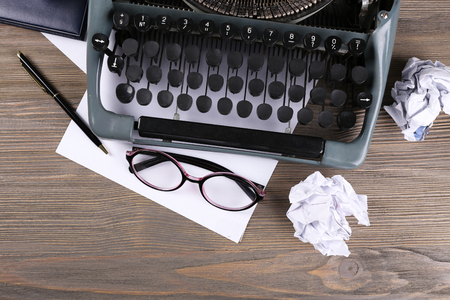 Retro typewriter on wooden table, top viewの写真素材