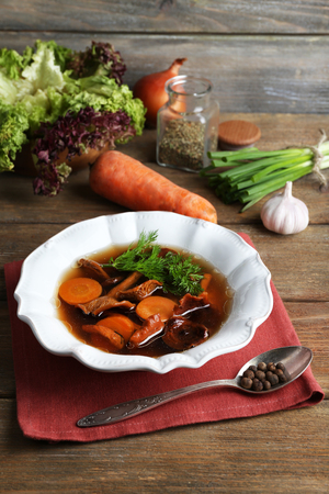 Mushroom soup on wooden backgroundの写真素材