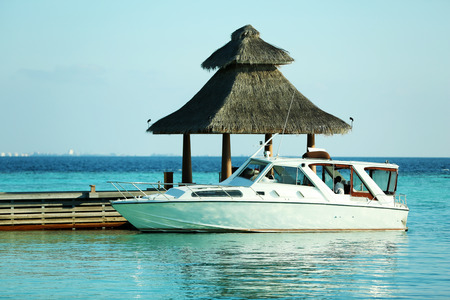 Yacht berth in ocean water in resortの写真素材