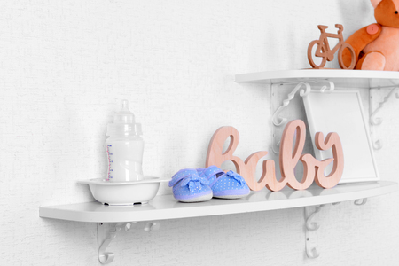 Baby accessories on shelves close-upの写真素材