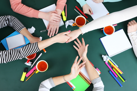 Creative team for work flow on blackboard background top view の写真素材