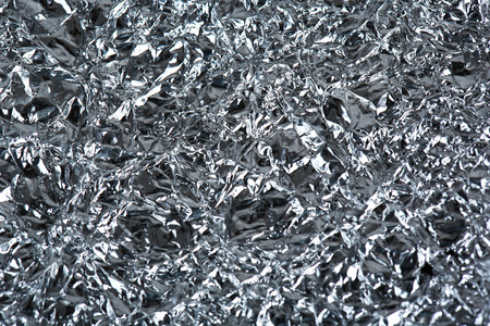 Crumpled color foil texture backgroundの写真素材