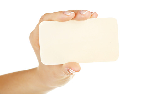 Hand holding business card, isolated on whiteの写真素材