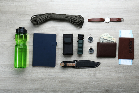 Set of trip stuff on wooden backgroundの写真素材