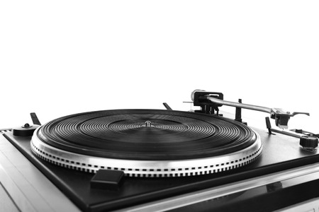 Vintage turntable vinyl record player isolated on whiteの写真素材