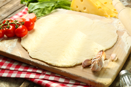 Food ingredients for pizza on table close upの写真素材