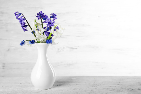 Fresh hyacinth flowers on white wooden backgroundの写真素材