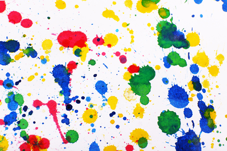 Colorful splashes of paint as backgroundの写真素材