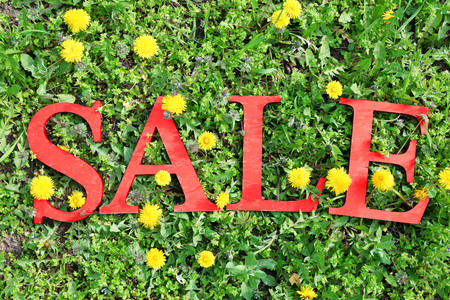 Sale on green field backgroundの写真素材