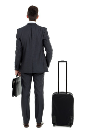 Man holding suitcase isolated on whiteの写真素材